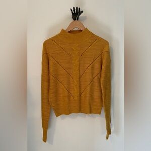 XL Mustard yellow mock neck cable knit detail. Cozy back to school. Ardene